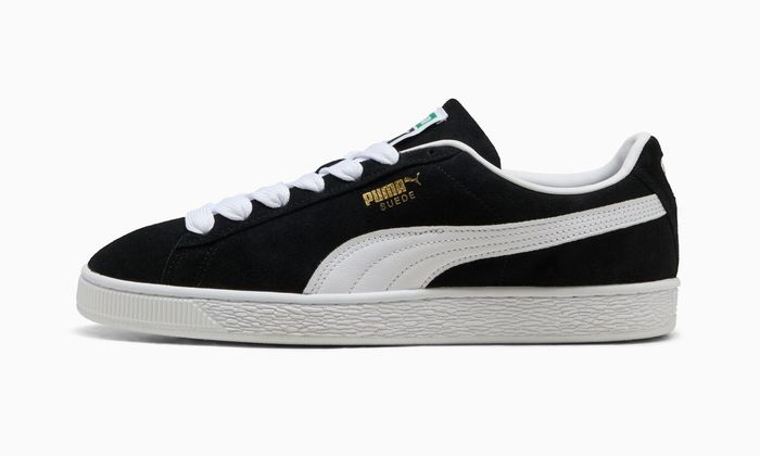 Zwarte Puma Suede met witte streep, suede sneaker die om onderhoud vraagt
